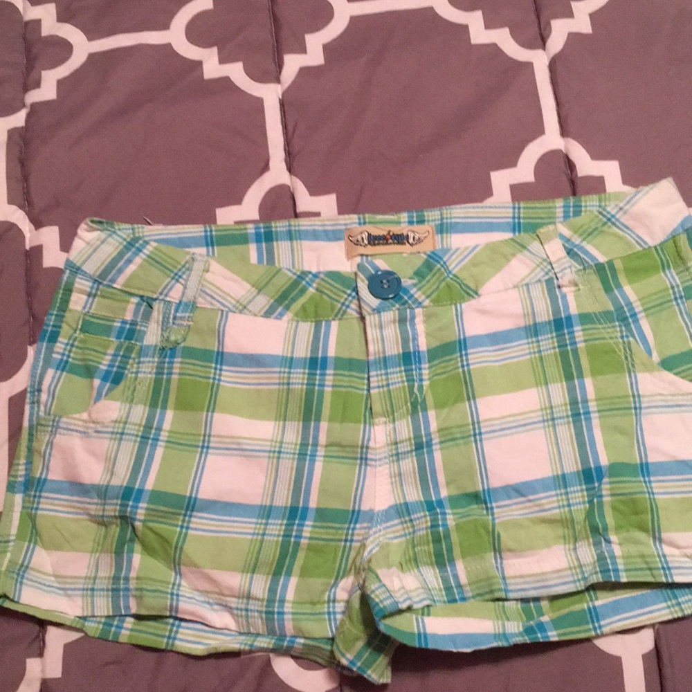Blue, green, white shorts.